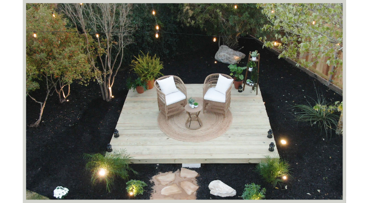 floating deck in a garden with lawn chairs sitting on top